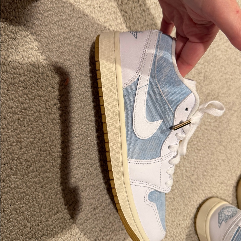 Jordan women’s White and Light Blue Sneakers